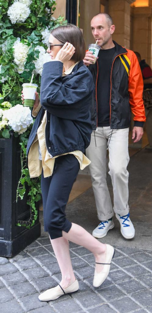 Lily Collins in a Black Jacket