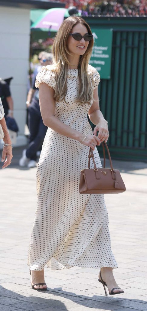 Lily James in a White Polka Dot Dress