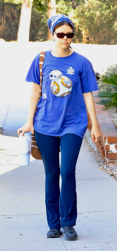 Mia Goth in a Blue Tee