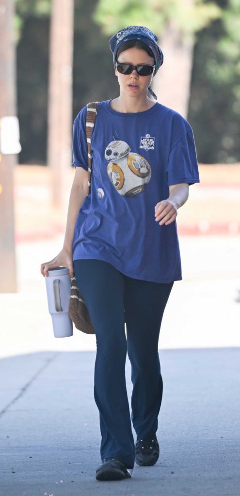 Mia Goth in a Blue Tee