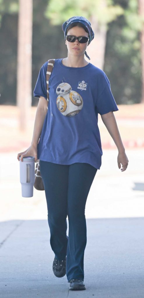 Mia Goth in a Blue Tee
