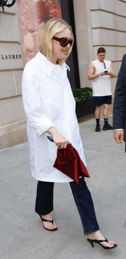 Dakota Fanning in a White Trench Coat