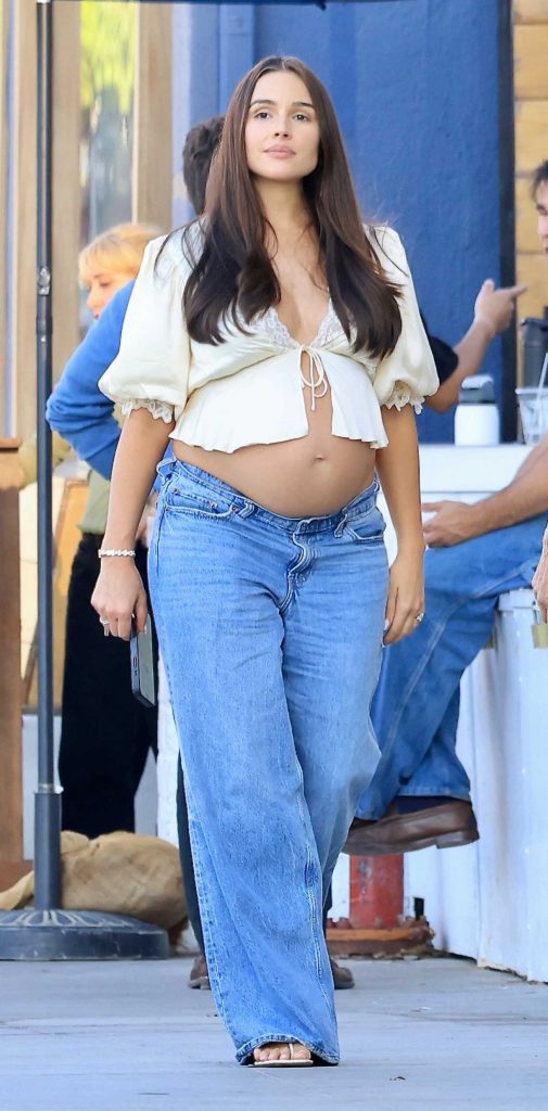 Olivia Culpo in a Beige Blouse
