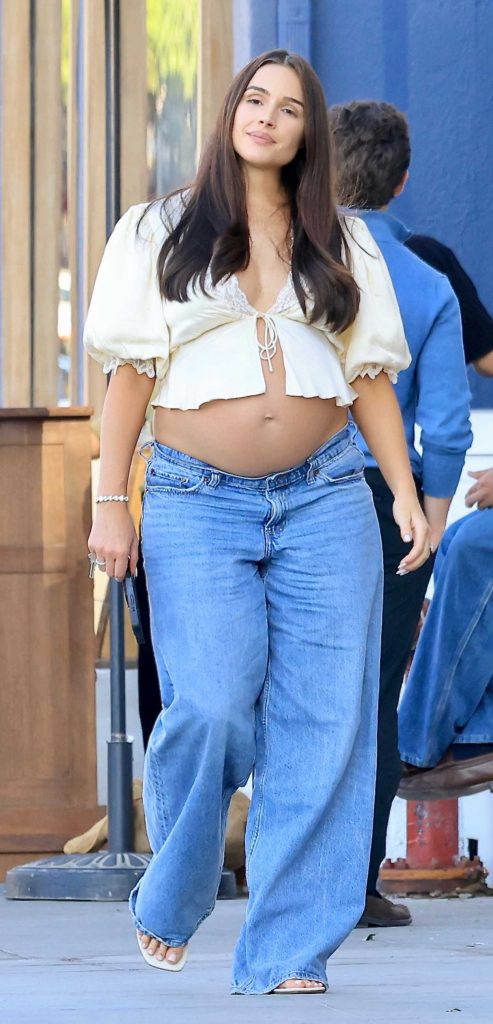 Olivia Culpo in a Beige Blouse
