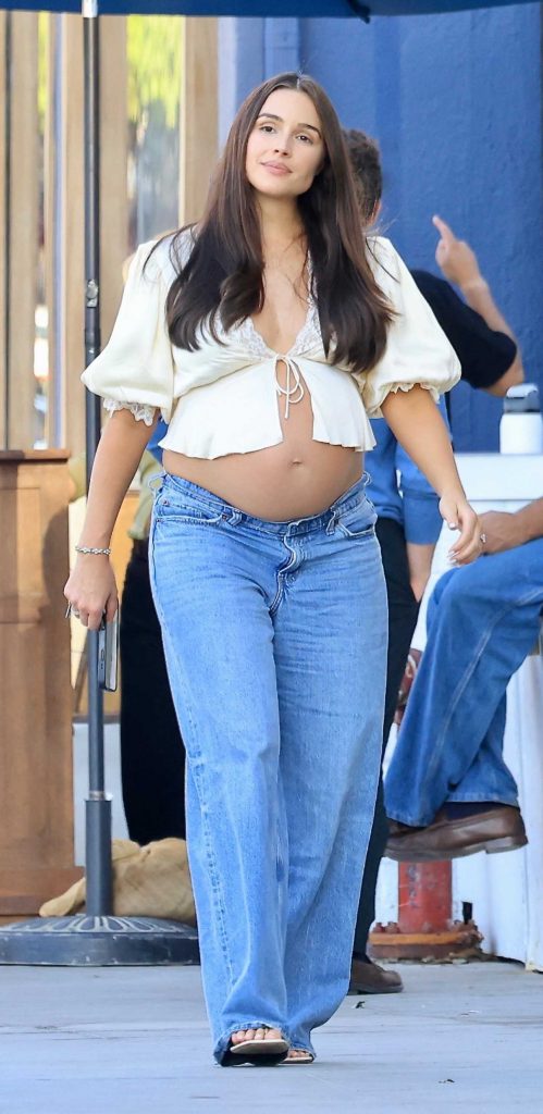 Olivia Culpo in a Beige Blouse