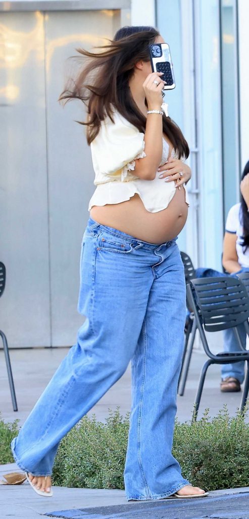 Olivia Culpo in a Beige Blouse