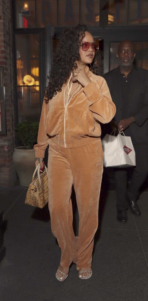 Rihanna in an Orange Tracksuit