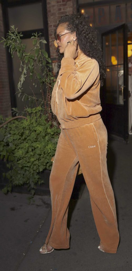 Rihanna in an Orange Tracksuit