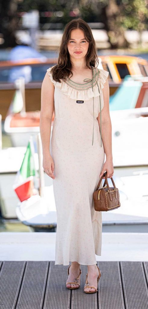 Cailee Spaeny in a Beige Dress
