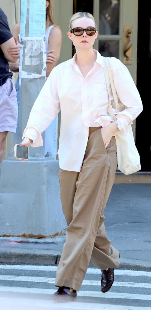 Elle Fanning in a Pink Shirt