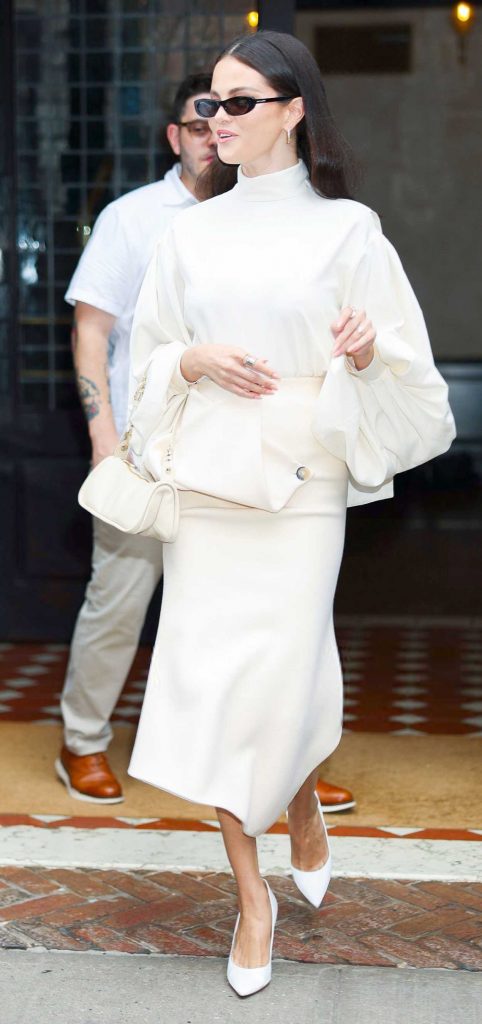Selena Gomez in a Beige Skirt