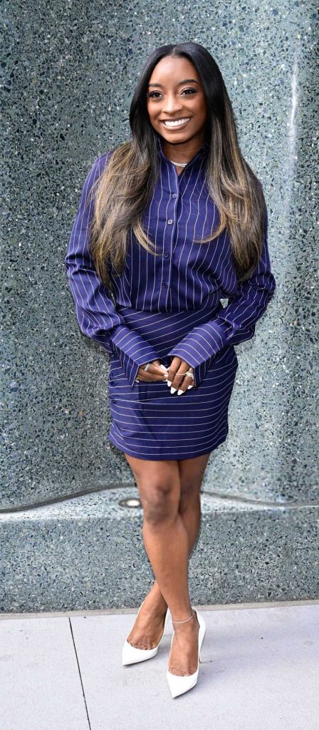 Simone Biles in a Blue Striped Ensemble
