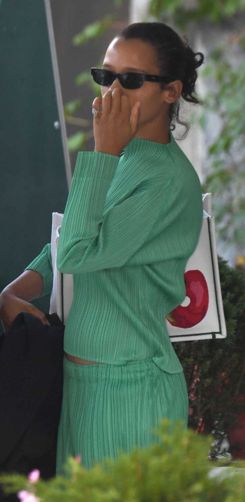 Taylor Russell in a Green Dress