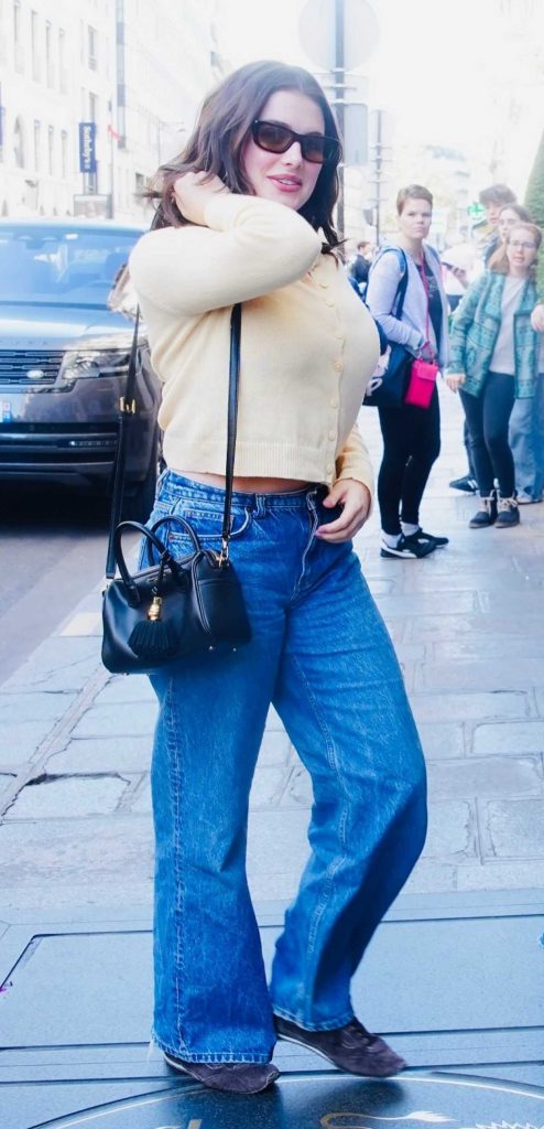 Ella Bright in a Beige Cardigan
