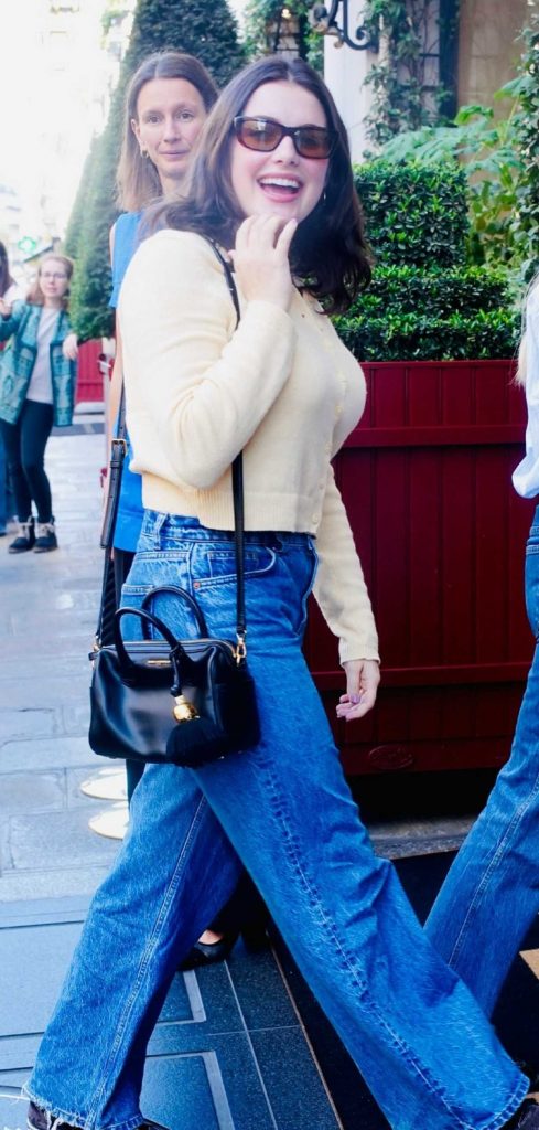 Ella Bright in a Beige Cardigan