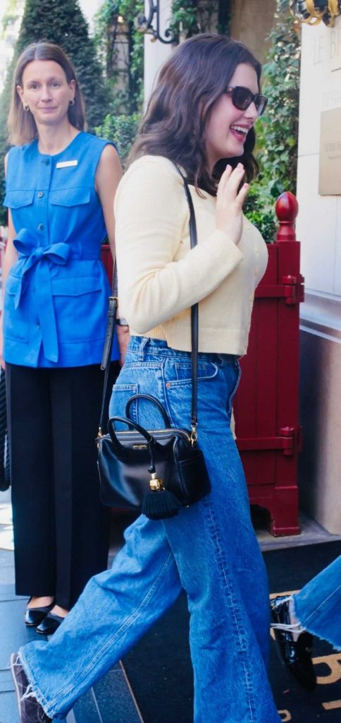 Ella Bright in a Beige Cardigan