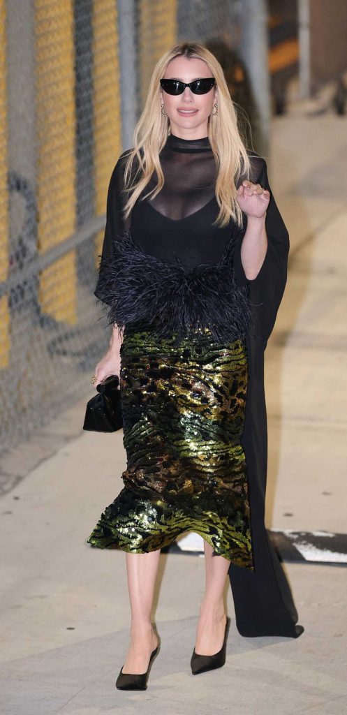Emma Roberts in a Black Blouse