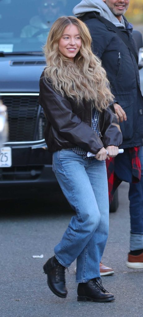 Sydney Sweeney in a Brown Leather Jacket