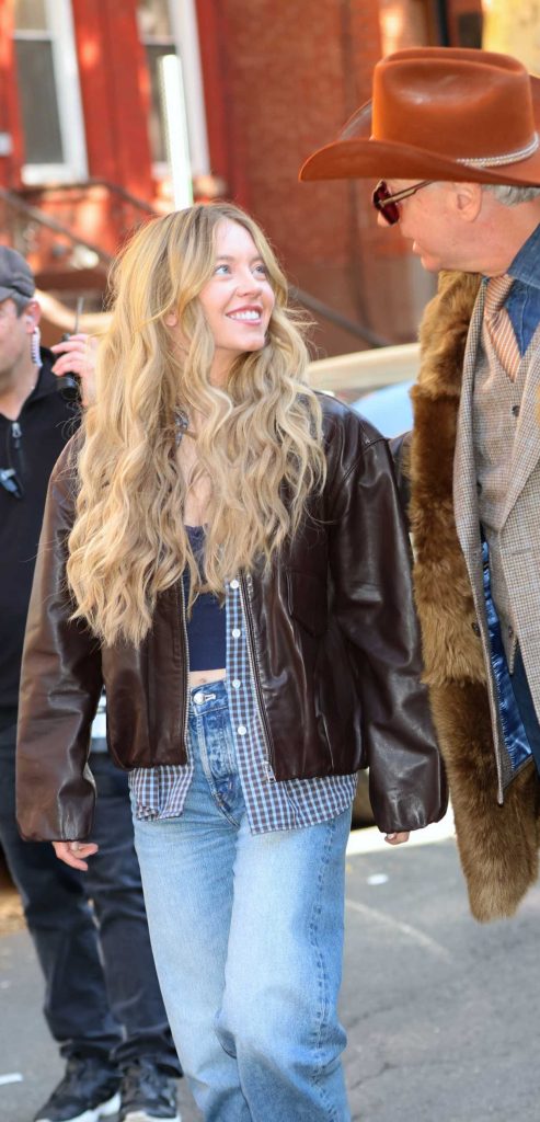 Sydney Sweeney in a Brown Leather Jacket