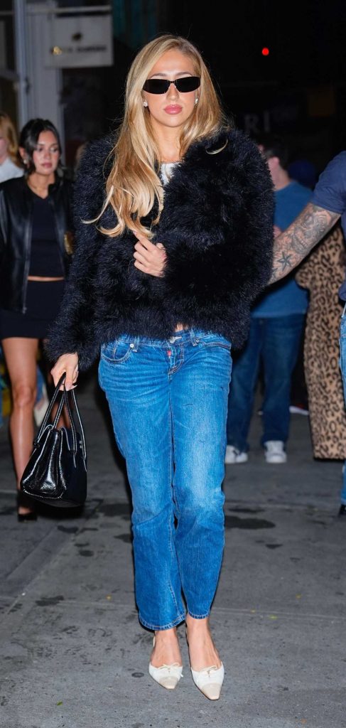 Tate McRae in a Blue Jeans