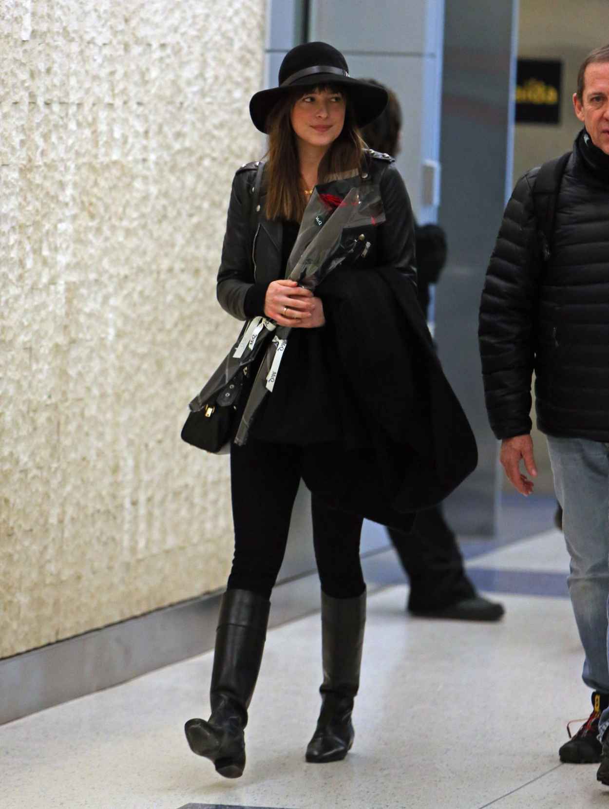 Dakota Johnson at JFK Airport, February 2015 – celebsla.com