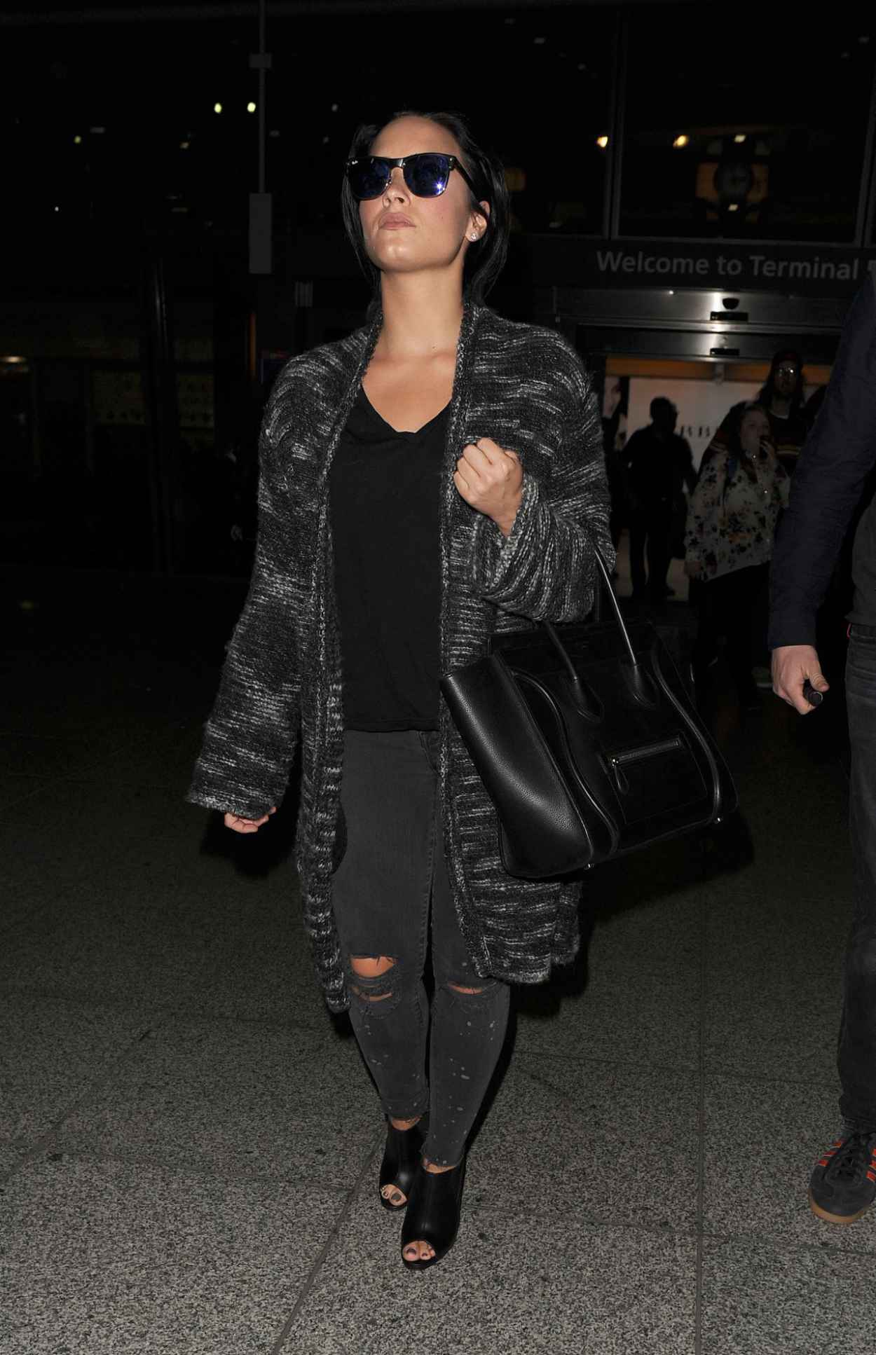 Demi Lovato Airport Style – Heathrow Airport in London, September 2015