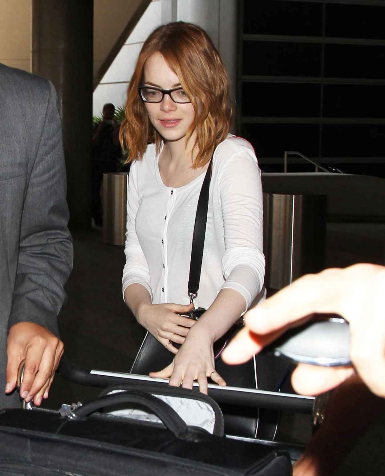 Emma Stone at LAX Airport, May 2015 – celebsla.com