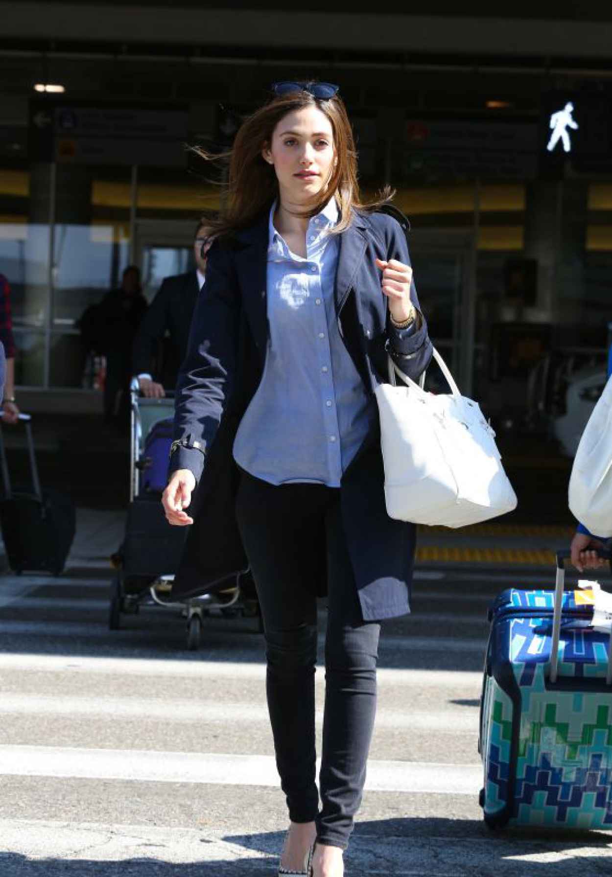 Emmy Rossum at LAX Airport in Los Angeles – May 2015 – celebsla.com