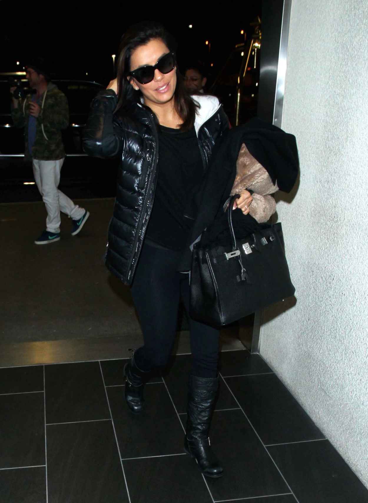 Eva Longoria – Arriving at LAX Airport in Los Angeles, January 2015 ...