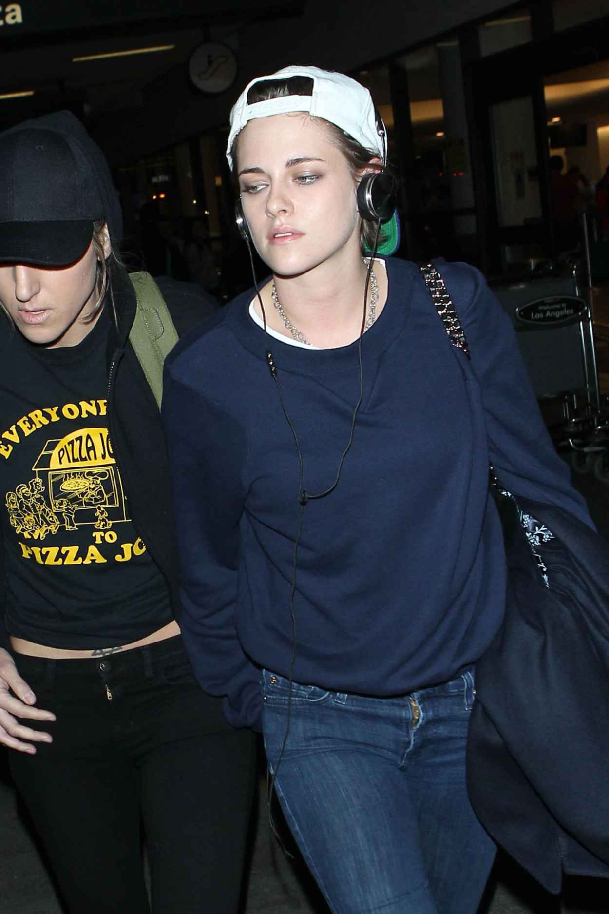 Kristen Stewart – Back at LAX Airport, February 2015 – celebsla.com