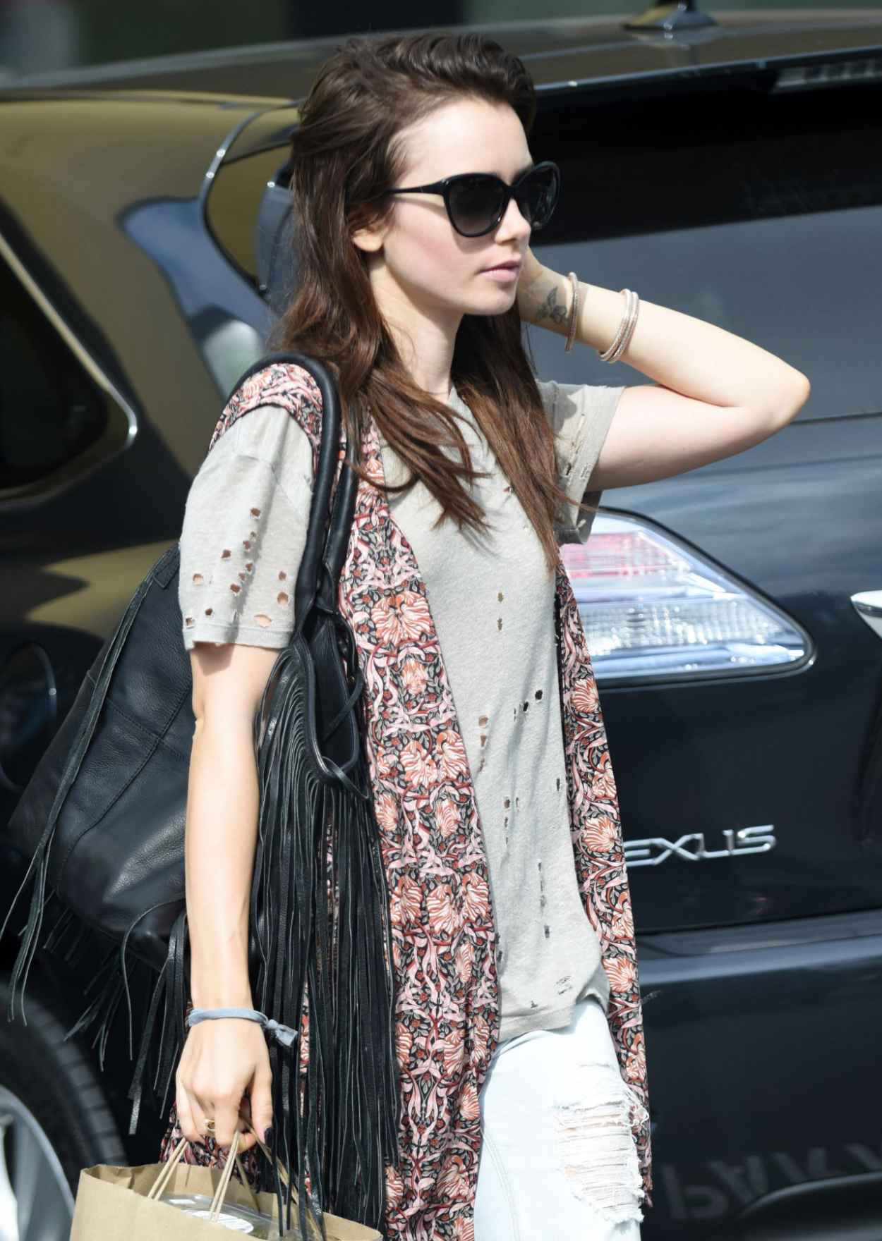 Lily Collins in Ripped Jeans – Out in West Hollywood, September 2015