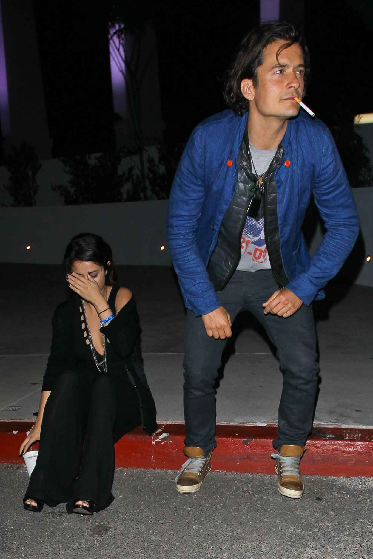 Selena Gomez and Orlando Bloom Outside LA Forum – April 2015 – celebsla.com